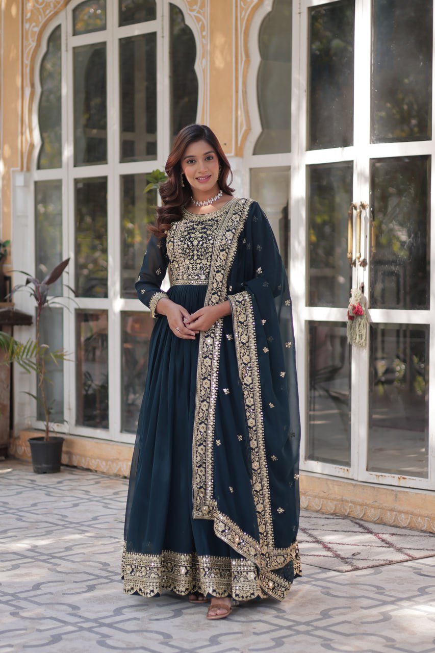Women's Luxurious Plum Velvet Anarkali Gown with Heavy Gold Zari & Sequin Embroidery – Perfect for Weddings & Grand Festivities