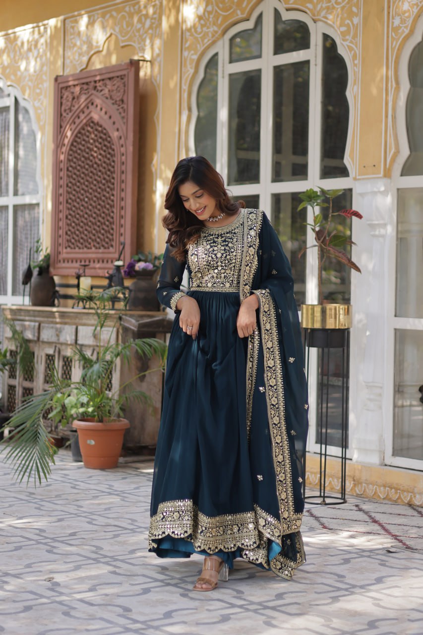 Women's Luxurious Plum Velvet Anarkali Gown with Heavy Gold Zari & Sequin Embroidery – Perfect for Weddings & Grand Festivities