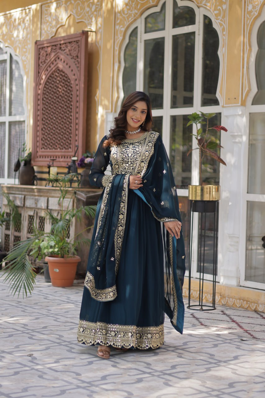 Women's Luxurious Plum Velvet Anarkali Gown with Heavy Gold Zari & Sequin Embroidery – Perfect for Weddings & Grand Festivities