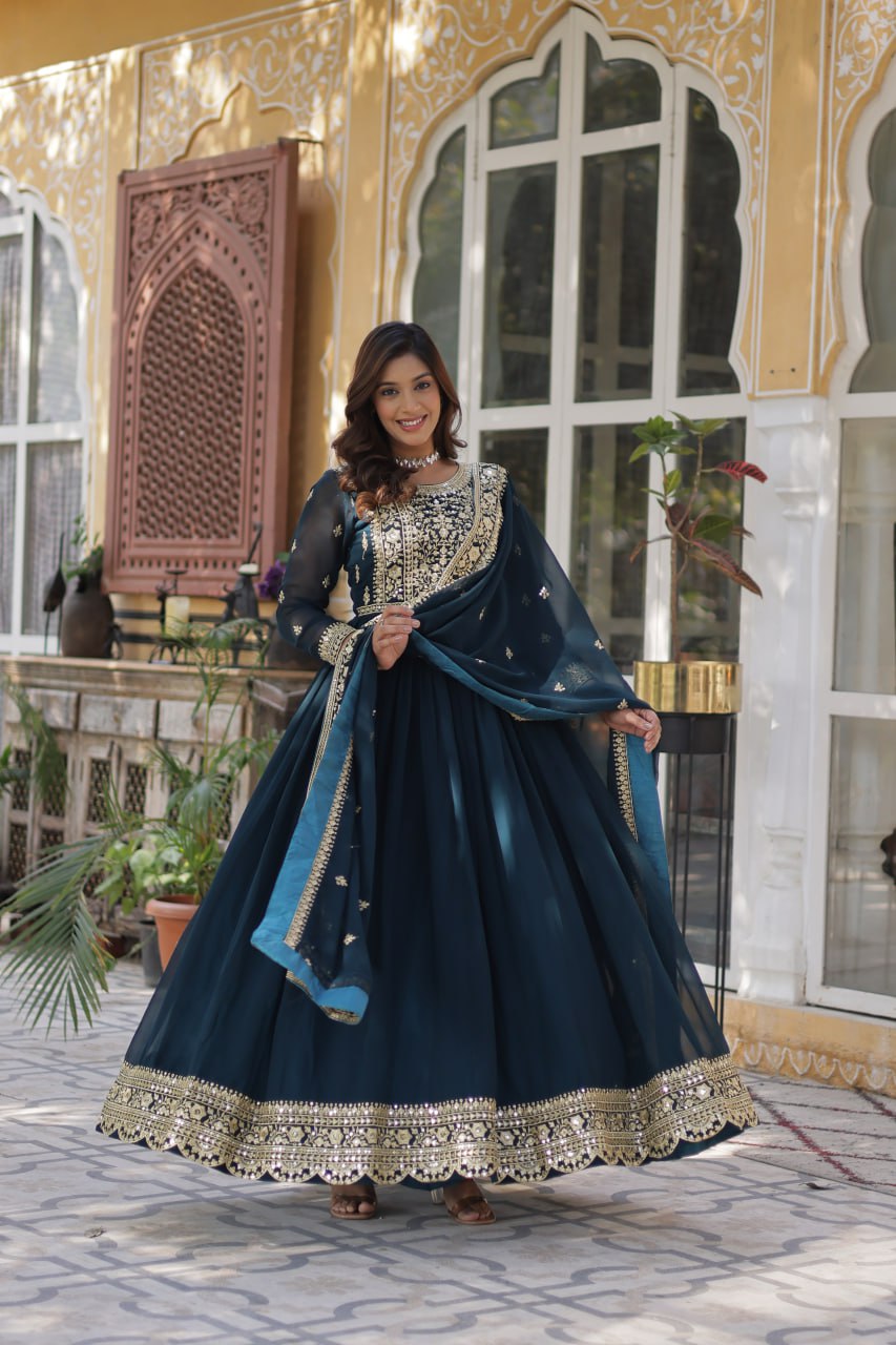 Women's Luxurious Plum Velvet Anarkali Gown with Heavy Gold Zari & Sequin Embroidery – Perfect for Weddings & Grand Festivities