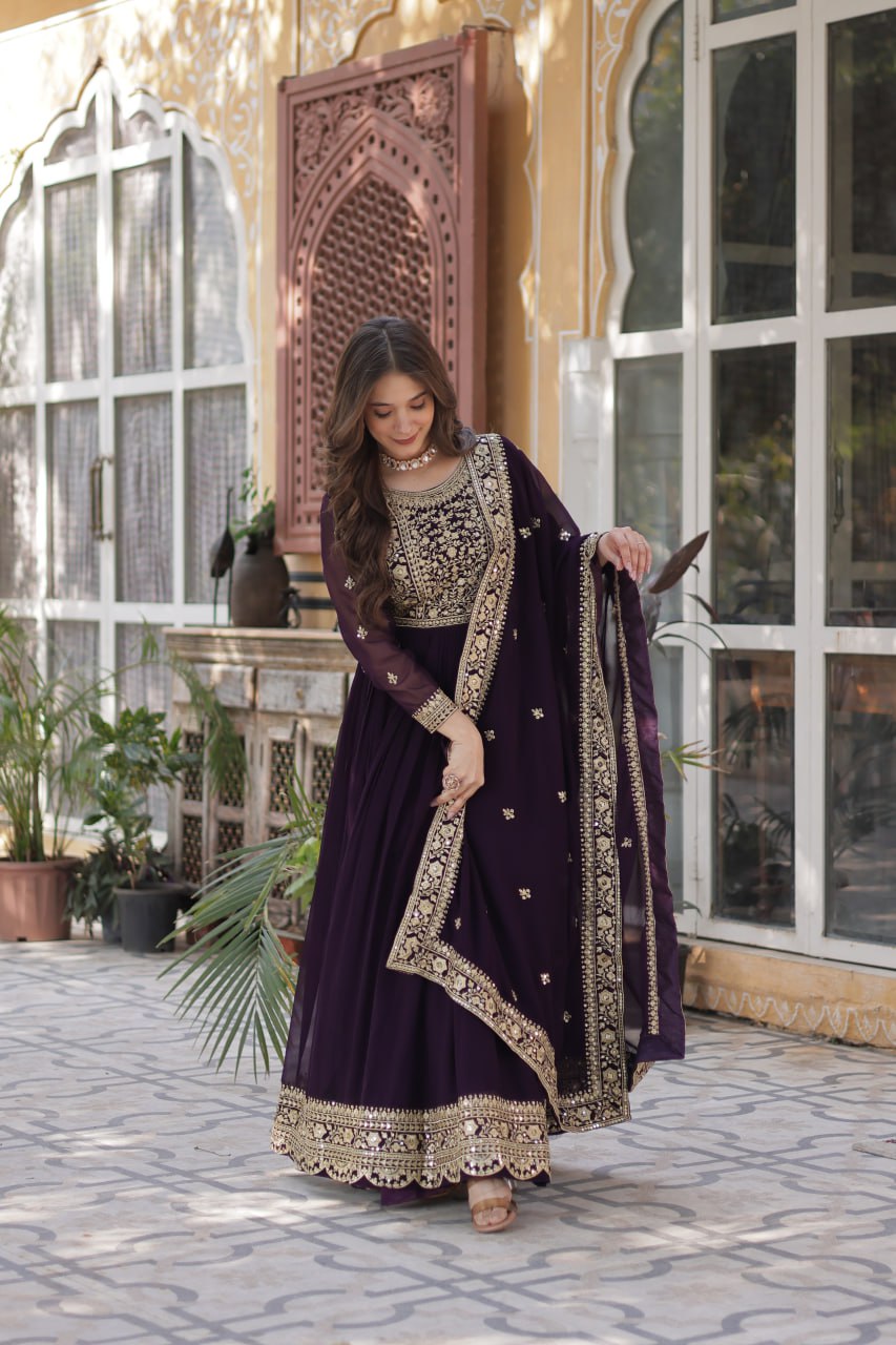 Women's Luxurious Plum Velvet Anarkali Gown with Heavy Gold Zari & Sequin Embroidery – Perfect for Weddings & Grand Festivities