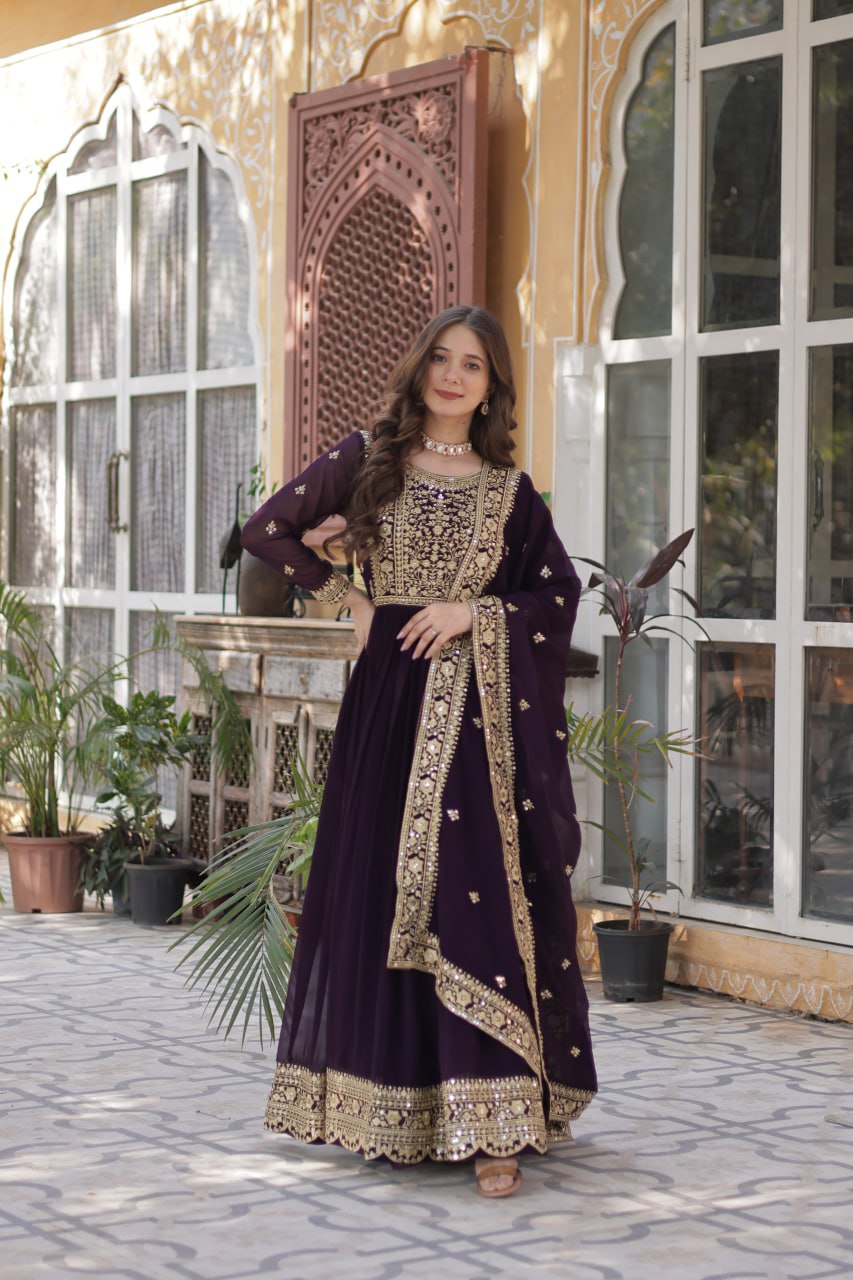 Women's Luxurious Plum Velvet Anarkali Gown with Heavy Gold Zari & Sequin Embroidery – Perfect for Weddings & Grand Festivities