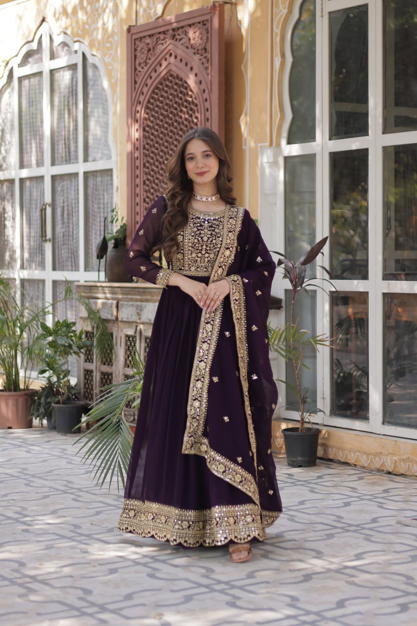 Women's Luxurious Plum Velvet Anarkali Gown with Heavy Gold Zari & Sequin Embroidery – Perfect for Weddings & Grand Festivities
