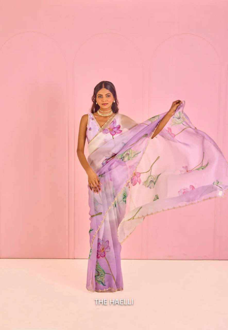 Women's Exquisite Lavender & White Organza Saree with Hand-Painted Lotus Floral Motifs & Gold Embellished Border – Complete with Matching Printed Blouse for Festive & Special Occasions