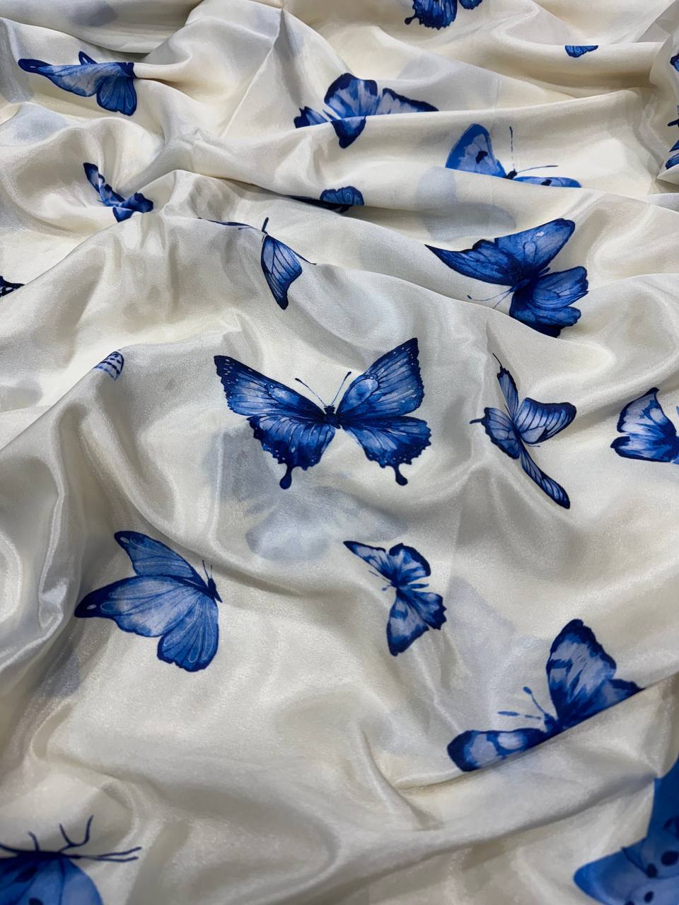 Women's Chic Snow White Georgette Saree with Vibrant Blue Butterfly Digital Print & Contrasting Border – Perfect for Casual Outings & Day Events