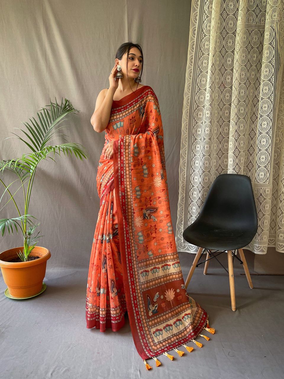 Women's Artistic Terracotta Orange Linen Saree with Kalamkari Inspired Print & Tassel Detailing – Perfect for Casual Festivities & Cultural Events