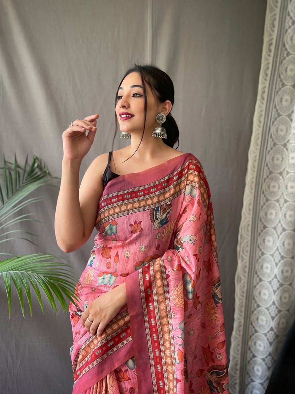 Women's Artistic Terracotta Orange Linen Saree with Kalamkari Inspired Print & Tassel Detailing – Perfect for Casual Festivities & Cultural Events