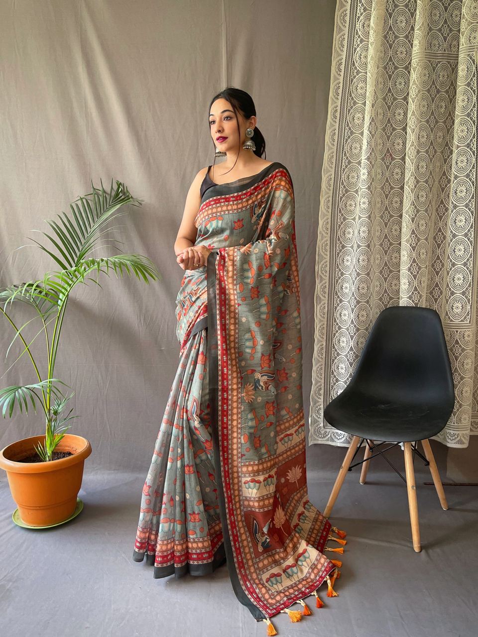 Women's Artistic Terracotta Orange Linen Saree with Kalamkari Inspired Print & Tassel Detailing – Perfect for Casual Festivities & Cultural Events