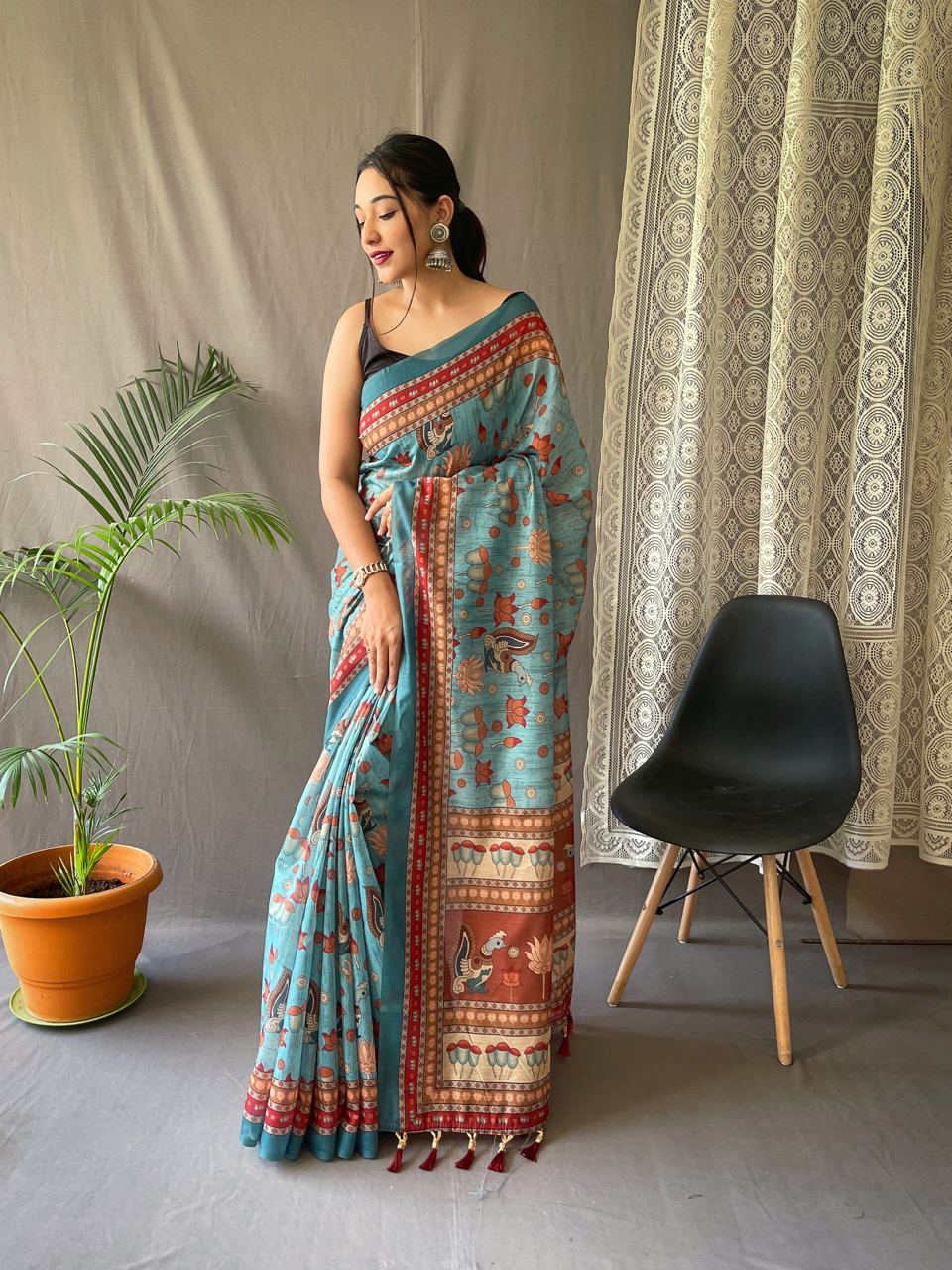 Women's Artistic Terracotta Orange Linen Saree with Kalamkari Inspired Print & Tassel Detailing – Perfect for Casual Festivities & Cultural Events