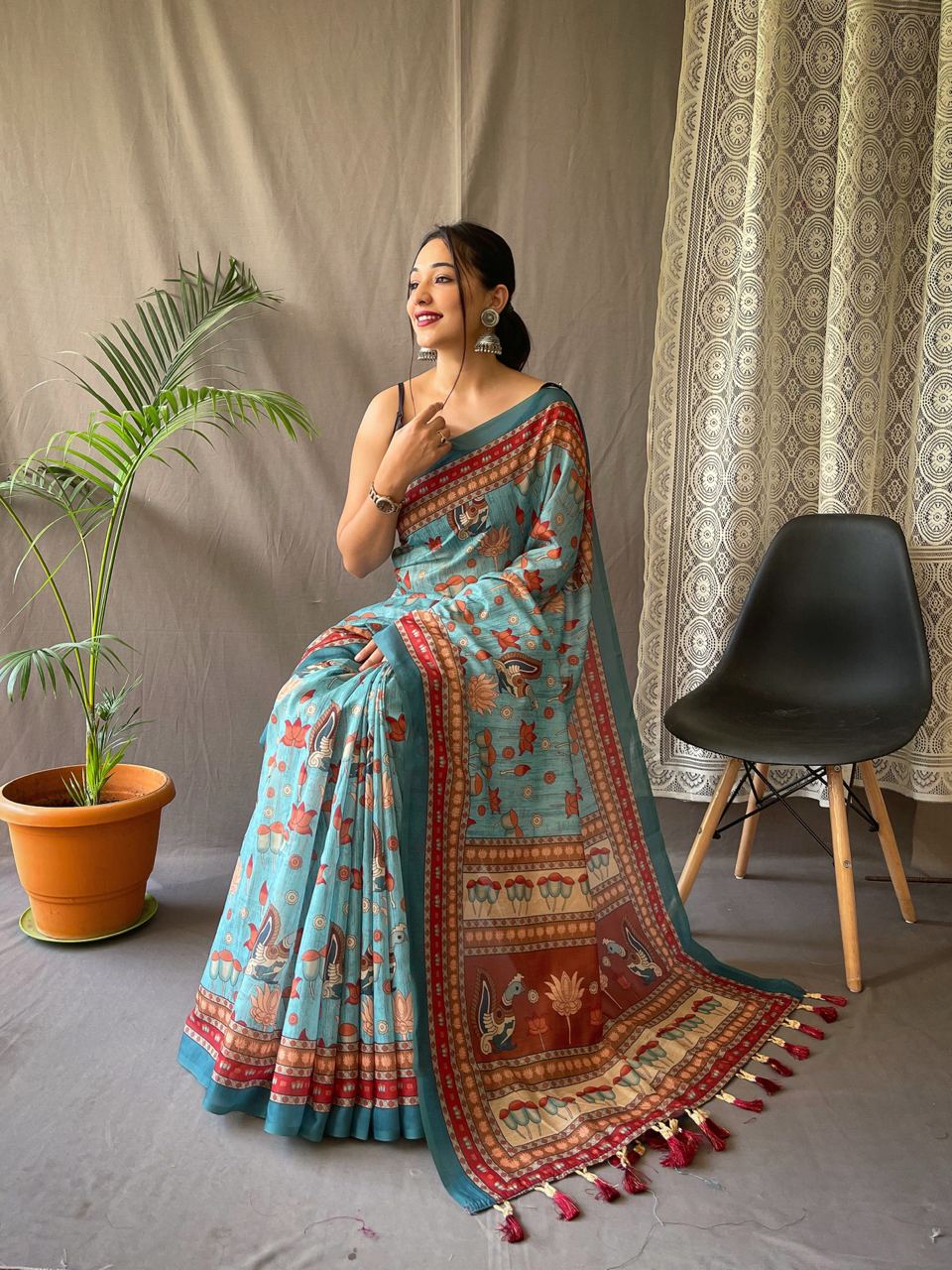 Women's Artistic Terracotta Orange Linen Saree with Kalamkari Inspired Print & Tassel Detailing – Perfect for Casual Festivities & Cultural Events
