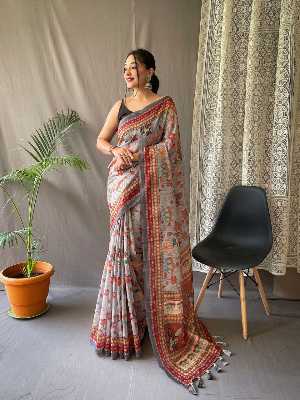 Women's Artistic Terracotta Orange Linen Saree with Kalamkari Inspired Print & Tassel Detailing – Perfect for Casual Festivities & Cultural Events