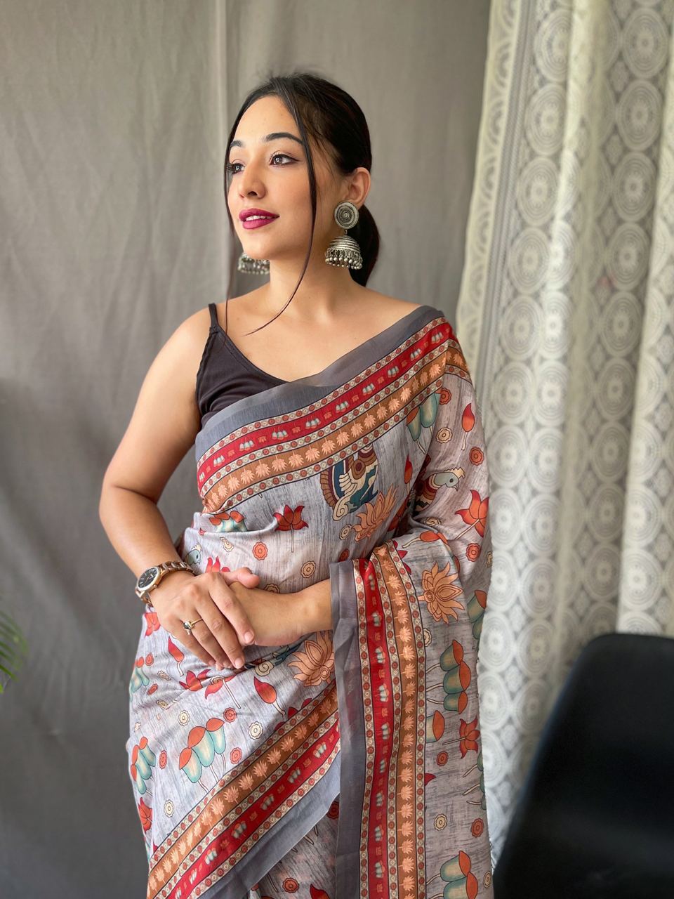 Women's Artistic Terracotta Orange Linen Saree with Kalamkari Inspired Print & Tassel Detailing – Perfect for Casual Festivities & Cultural Events