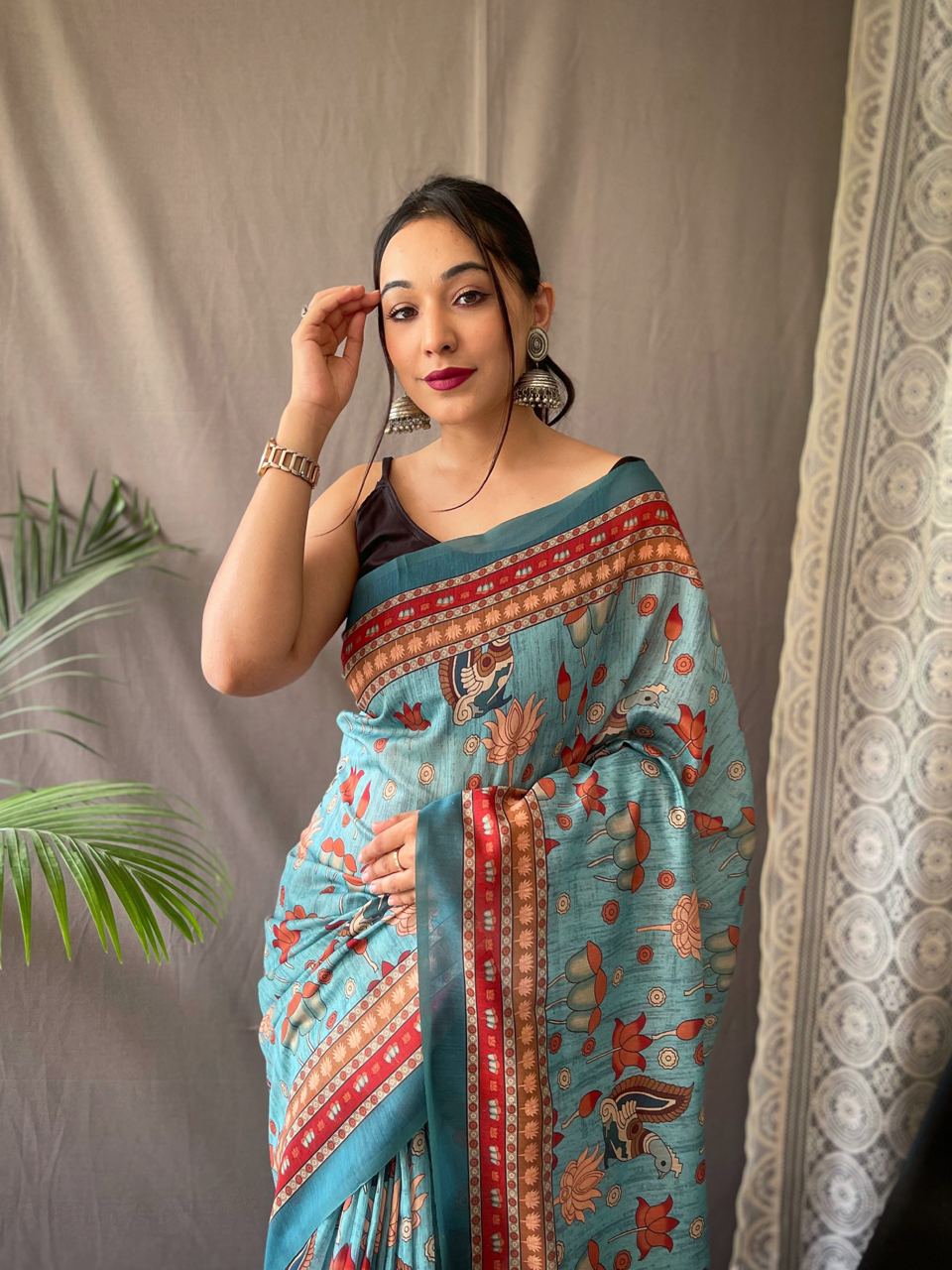 Women's Artistic Terracotta Orange Linen Saree with Kalamkari Inspired Print & Tassel Detailing – Perfect for Casual Festivities & Cultural Events